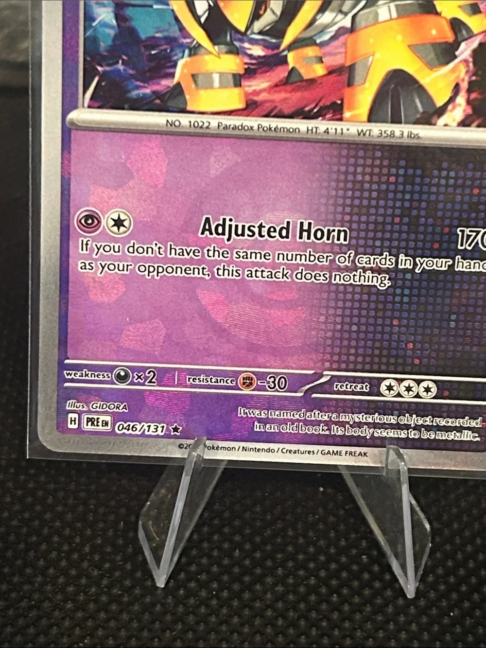 Pokemon Iron Boulder Pokeball 046/131 Holo from Prismatic Evolutions M/NM